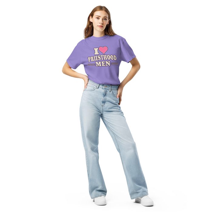 Woman in jeans wearing the violet I heart Priesthood Men tee